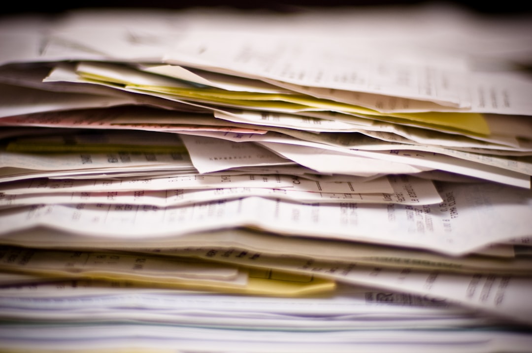 A close-up of a stack of papers - Photo by Camilo Rueda Lopez on Unsplash