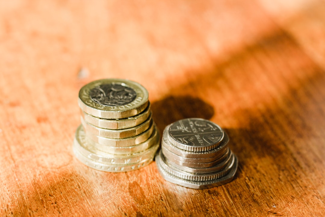 silver and gold round coins - Photo by Sarah Agnew on Unsplash