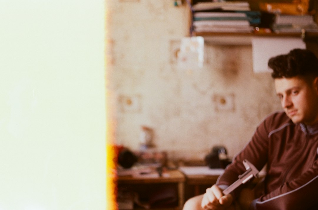 person in black and white striped long sleeve shirt - Photo by Anja Faust on Unsplash
