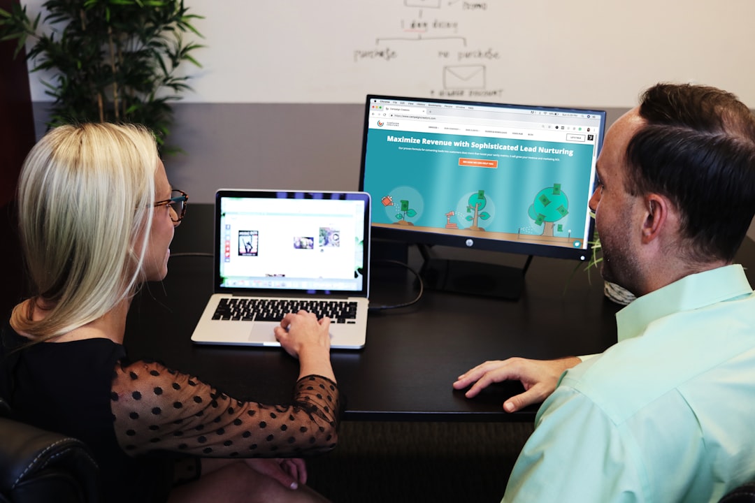 man and woman sitting down in front of table - Photo by Campaign Creators on Unsplash