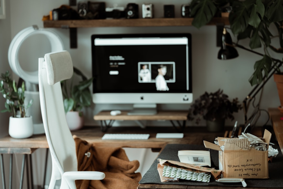 black flat screen tv on brown wooden tv rack — Photo by Annie Spratt on Unsplash